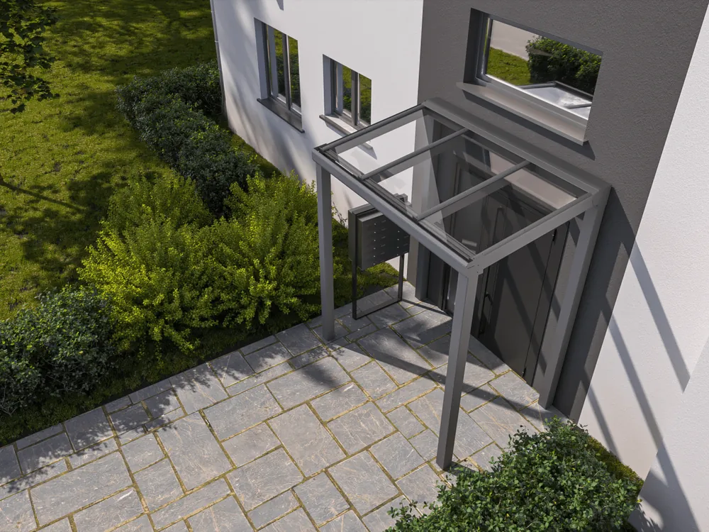 Aluminium entreeoverkapping boven de voordeur van een woning